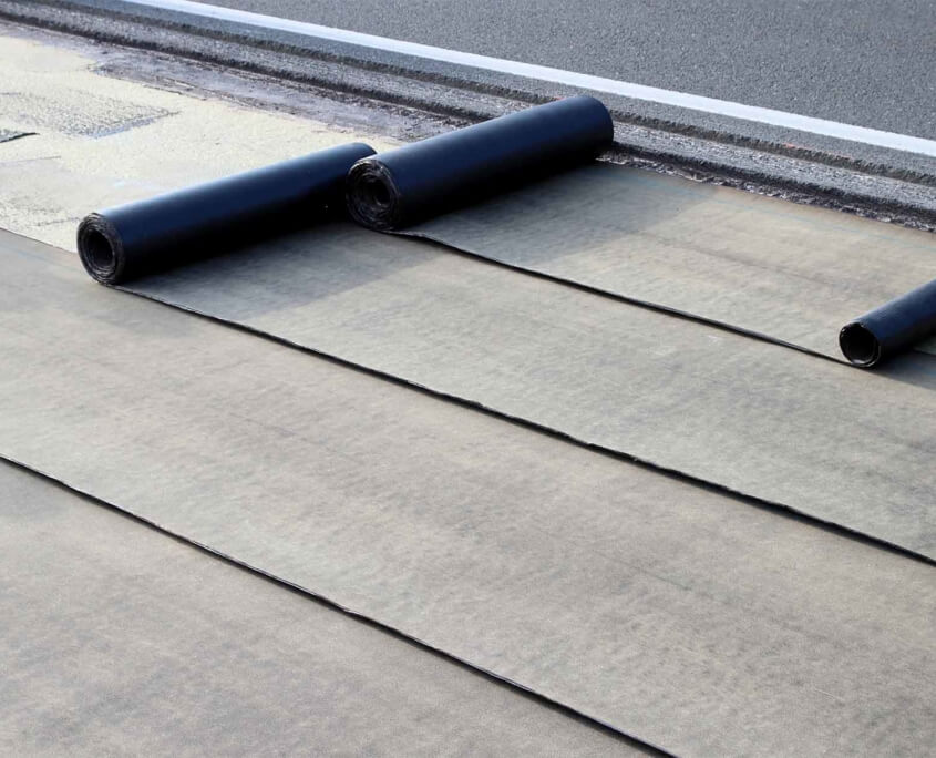 rolls of asphalt on commercial roof