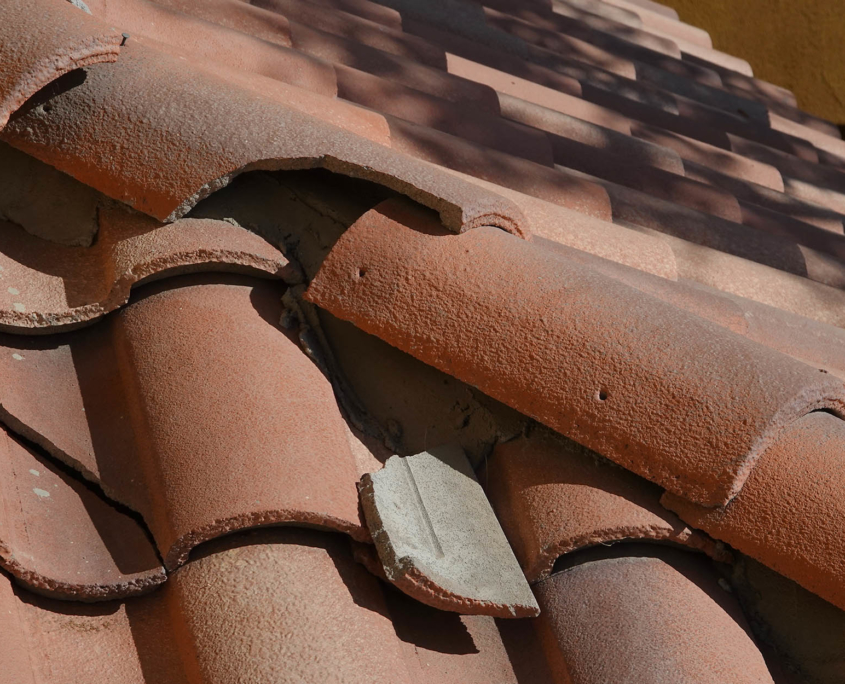Rooftop tiles needing repair in small areas