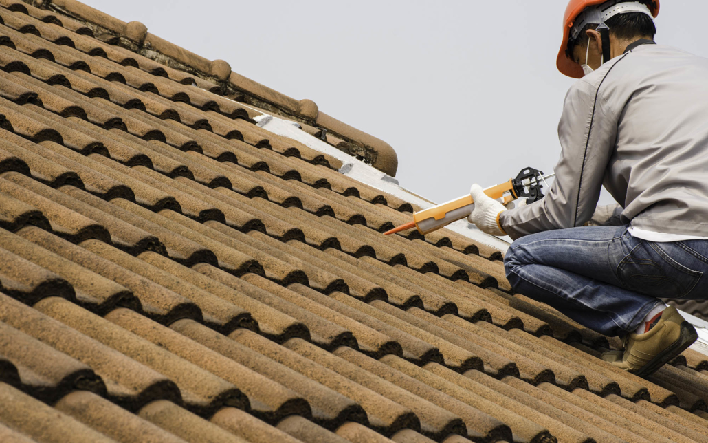 Side view of tile roof repairs