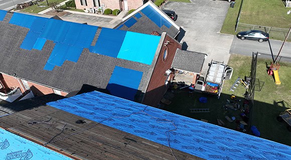roof damage by hurricane category emergency tarping
